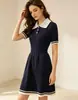 Vestido estilo coreano, nueva colección de otoño, estilo universitario, moderno, rejuvenecedor, ajustado a la cintura, adelgazante, cuello polo, suéter de punto, falda ajustada
