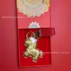Popular Chaveiro Cavalo Pequeno de Ouro Puro Caixa de Presente Pingente Decoração de Bolsa Presente de Ano Novo Venda por Atacado