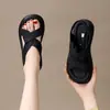 Sandalias antideslizantes ligeras y elegantes de suela blanda para mujer, nuevas zapatillas planas versátiles de verano 2026 que no cansan los pies, zapatos de playa