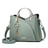 Bolso de mano de moda estilo coreano color gran capacidad para mujer bolso de hombro cruzado de moda al por mayor bolso cubo transfronterizo
