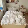 Juego de cuatro piezas de encaje de algodón puro estilo Ins para chica, nueva funda de edredón 100% algodón, sábana suave y acogedora, juego de tres piezas para dormitorio