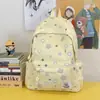 Mochila de estudante de ensino médio graffiti transfronteiriça universitário nicho versátil estampa de estrela bolsa escolar mochila de grande capacidade feminina