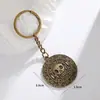 Chaveiros de Piratas do Caribe em estoque, chaveiro de caveira com moeda de ouro transfronteiriça, mercadorias do filme, pequenos presentes