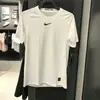 Nova Camiseta Americana de Manga Curta Justa para Fitness Corrida Treinamento Basquete Respirável Secagem Rápida Top Esportivo para Homens e Mulheres