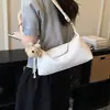 Bolso de mano retro minimalista de nicho para mujer, nuevo modelo primavera 2026, bolso de hombro y cruzado de alta gama, elegante y a la moda