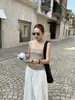 Top Camisola Ajustado Estilo Francés Wanwei para Mujer Primavera 2026 Nuevo Estilo Tirante Fino Borde Enrollado Chaleco de Punto P4065