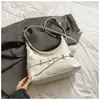 Bolsa tote simples e casual, nova moda estilo coreano 2026, bolsa de ombro de grande capacidade, bolsa transversal de cor sólida com alta estética