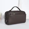 Bolsas de Mão de Couro Bovino de Primeira Camada Transfronteiriças, Bolsas Casuais de Couro Genuíno para Negócios, Estoque Pronto do Fabricante Venda por Atacado de Bolsas de Mão Masculinas