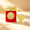 Año de la Oveja Moneda Conmemorativa de la Suerte Bolsa de Tela Roja Tres Ovejas Trayendo Prosperidad Hoja de Oro de Imitación Moneda de Oro de Año Nuevo Personalización Regalo de Año Nuevo Transfronterizo Venta al por Mayor
