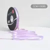 Lazo de regalo de color sólido de 1 cm flor decorativa para envolver material para ramos de cinta de satén venta al por mayor