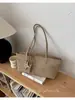 Bolsa de ombro para o trabalho de estilo coreano transfronteiriça, nicho, sob o braço, bolsa de mão versátil retro francesa, bolsa de ombro única estilosa, moderna