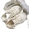 Sapatos brancos finos de verão para mulheres 2023 novos sapatos de lona respiráveis com sapatos de saia meias chinelos slip-on sapatos femininos