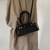 Design de ombro único, estilo versátil 2026 para o dia a dia, bolsa de mão niche estilo boliche, bolsa transversal para mulheres, novo modelo