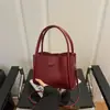 Bolsa da Moda de Alto Nível Estilo Coreano para Mulheres 2025 Nova Bolsa Transversal de Nicho, Bolsa Balde Casual Simples Estilo Ocidental para Mulheres