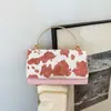 Bolso de Hombro Cruzado de Cadena con Estampado Nuevo de Vaca de Gran Capacidad para Mujer, Tendencia Verano 2025, para Viajes, de Mano, Bajo el Brazo
