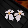Pendientes de flor de aguja de plata de súper hada francesa, pendientes de atmósfera de Joker dulce, pendientes de temperamento de moda de alto sentido, al por mayor