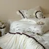Estilo de corte francés, algodón cepillado 100S, bordado, 100% algodón puro, juego de ropa de cama de cuatro piezas o tres piezas, caja de regalo de alta gama