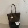 Bolso de mano grande de estilo coreano, minimalista y elegante, bolso cruzado con acabado mate, bolso de cadena minimalista de nicho, bolso de hombro tipo cubo para mujer
