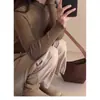 Camiseta base de punto para mujer con cuello semi-alto y bajo con volantes para primavera y otoño, corte ajustado, hombro normal, manga larga, modelo nuevo 2026