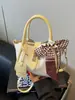 Bolsas pequeñas transfronterizas populares para mujer de este año, nuevos bolsos cruzados versátiles de moda para el verano de 2026, bolsos tipo cubo de estilo coreano