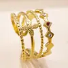 Joyería de Acero Inoxidable de Venta Caliente Transfronteriza, Anillo Abierto de Moda y Gama Alta Chapado en Oro de 18 Quilates, Prensado en Aceite Incrustado con Diamantes de Colores, Anillo de Acero de Titanio