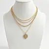Cadena de Perlas Oceánicas de Venta Caliente Transfronteriza Europea y Americana Cadena para Clavícula de Mujer Colgante de Estrella de Mar y Concha Collar Multicapa Apilable Venta al por Mayor