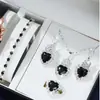 Set europeo y americano de cuatro piezas de diamante nuevo con forma de corazón, pedrería, collar azul claro, pendientes, anillo, set de cuatro piezas, damas, transfronterizo