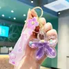 Pingente de estrela de cinco pontas, areia movediça e frangipani, decoração para bolsa e carro, mercadoria de suporte para leque, chaveiro, presente para o Dia do Professor