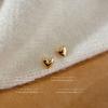 Aretes de tuerca encantadores de metal con superficie de paisaje frío para mujer, aretes pequeños y sencillos para combinar con todo, aretes de moda de alta gama al por mayor