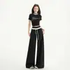 25 años primavera y verano nuevo diseño de encaje de color contrastante cintura elástica caída deportes casuales ligeramente holgados de campana pantalones para mujer