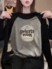 Elegante camiseta de manga larga para mujer, con bloques de color, manga raglán y algodón 100%, un básico versátil para el otoño