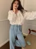 En stock foto real nuevo sentido del diseño camisa de muñeca de manga larga alto sentido bordado tridimensional camisa vintage para mujer 2025