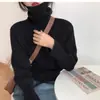 Suéter gola alta feminino para outono e inverno de 2025, casual e macio, de corte solto, com gola alta sobreposta, blusa de base em tricô