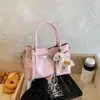 Bolsa de mão de luxo 2026 nova moda bolsa de ombro feminina versátil casual bolsa transversal texturizada bolsa feminina simples