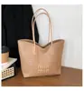 Bolsas de Mujer Transfronterizas Primavera 2026 Nuevas Versátiles Color Sólido Letra Gran Capacidad Bolsas de Hombro Único de Moda Bolso Tote