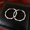 Brincos redondos em ouro 18k banhado com zircônia em formato de bambu, luxo leve e sensação de alta qualidade, brincos vintage requintados versáteis para mulheres