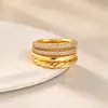 Anillos apilables de dos tonos de oro de 18 quilates y plata con diseño retorcido de circonita, juego de 4 piezas de anillos decorativos, joyería de mano transfronteriza europea y americana