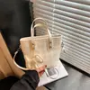 Bolso Pequeño Nuevo de Verano para Mujer, Patrón a Cuadros, Alto Valor Estético, Bolso Cruzado Personalizado para Hombro, Bolso Cubo de Mano de Moda
