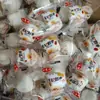 Tâmaras com leite recheadas com amêndoa, tâmaras com leite populares, tâmaras vermelhas, lanches de amêndoa, pequenos lanches, comida de lazer, nozes