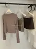 Conjunto de cárdigan simple Y.JIA Yijia para protección solar de principios de otoño + Chaleco con diseño de espalda descubierta + Falda de línea A para mujer 5021