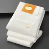Jeans Blancos de Alta Gama Estilo Business Italiano para Hombre, Pantalones Elásticos de Corte Ajustado, Versión Engrosada Otoño e Invierno 2026 con Forro Polar