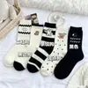 Calcetines de suelo a rayas estilo ins para otoño e invierno, versátiles, de dibujos animados, con temática de cachorros lindos, estilo japonés, combinan con todo, calcetines de media pantorrilla con un toque juvenil