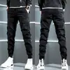 Pantalones casuales de primavera para hombre, estilo coreano, ajustados a la moda, pierna cónica, pantalones de trabajo modernos, pantalones largos multibolsillos, estilo deportivo