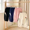 Pantalones deportivos infantiles de estilo europeo y americano, versión coreana, diseño color block, pantalones deportivos casuales para primavera y otoño, con puños elásticos