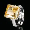Otoño e invierno nueva joyería cobre chapado en oro diamante de alto carbono diamante cuadrado flor de hielo cobre incrustado princesa cuadrado anillo de lujo mujeres 12*12