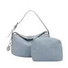 Bolso pequeño súper popular para mujer, nuevo bolso de mano de nicho 2026, elegante y versátil, se puede llevar al hombro o cruzado