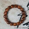 Atacado de fábrica pulseira de contas antigas de sândalo com couro de tigre anel liso simples contas de Buda anel para brincar joia de mão masculina e feminina