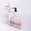 Toalha de ouro atacado fita de seda brilhante toalha de algodão macia e confortável casa absorvente toalha de rosto negócios
