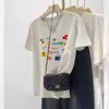 Camiseta Estampada com Laços Chic de Verão 2026 para Mulheres, Top de Algodão Puro com Ombro Normal, Estilo Coreano Jovem Estilo Ins Manga Curta Branco Leite Cinza