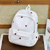 Nova mochila escolar para meninas, mochila com bordado de coração, grande capacidade, alto apelo estético, adequada para alunos do ensino fundamental, médio e médio